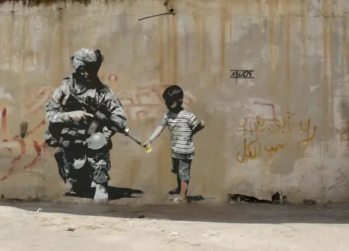 Bansky, Svelata Identità da Esperti Inglesi: E' Robin Gunningham