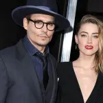 Amber Heard rischia carcere: porta cani in Australia senza autorizzazione