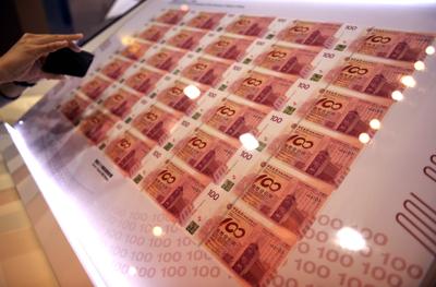 Cina brucia banconote per produrre elettricità: meno CO2 nell'atmosfera