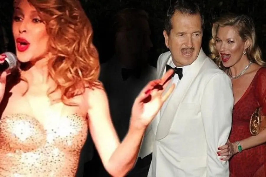 Mario Testino compie 60 anni: Kylie Minogue esce dalla torta