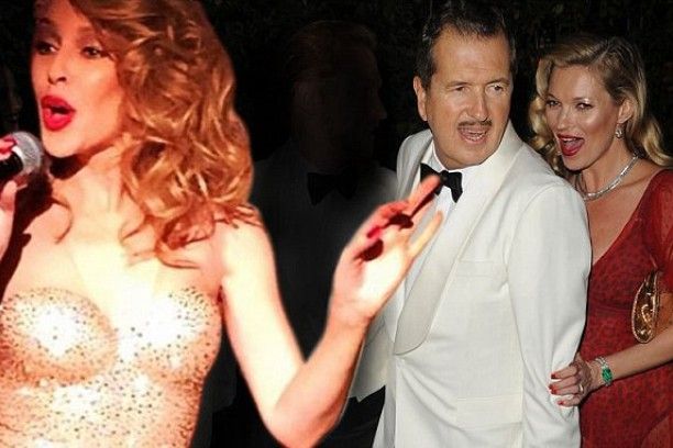 Mario Testino compie 60 anni: Kylie Minogue esce dalla torta